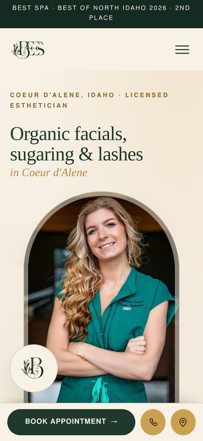 BEEs Day Spa&rsquo;s website shown on a phone, an esthetician studio in Coeur d&rsquo;Alene, Idaho